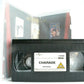 Charade [Postcards Included]: (1966) Thriller - Cary Grant/Audrey Hepburn - VHS-