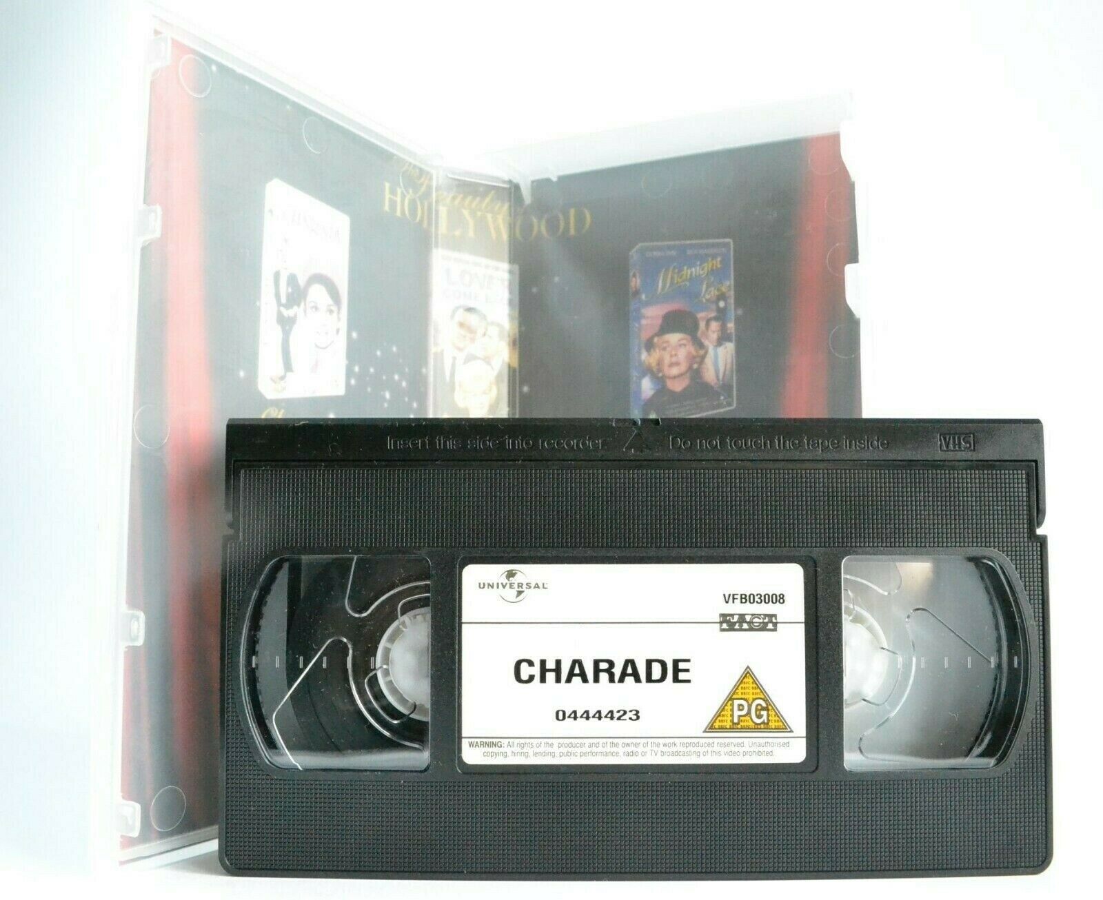 Charade [Postcards Included]: (1966) Thriller - Cary Grant/Audrey Hepburn - VHS-